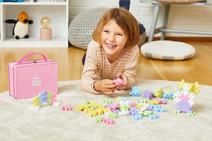PLUS PLUS Building Set with Metal Suitcase, Open Ended Stem Toy for Toddlers and Preschool, 70 Big Pastel Interlocking Pieces