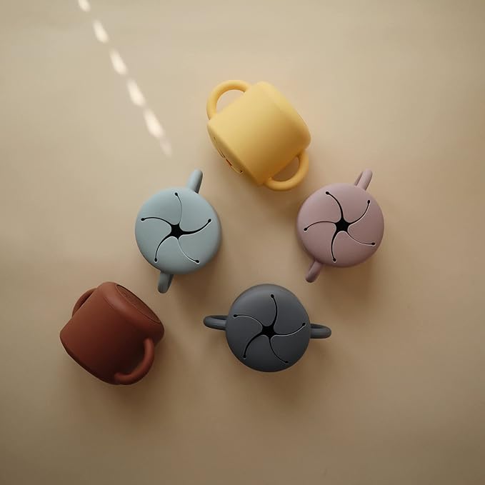 mushie Silicone Snack Cup | Spill Proof Food Container for Toddler and Baby (Daffodil)