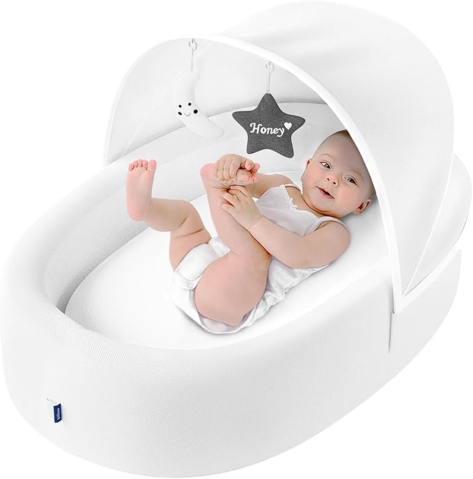 Premium Portable Baby Lounger Nest – Foldable Travel Bassinet for Newborn & Infant with Mesh Canopy, 2 Toys, Waterproof Mattress & Removable Cover – White