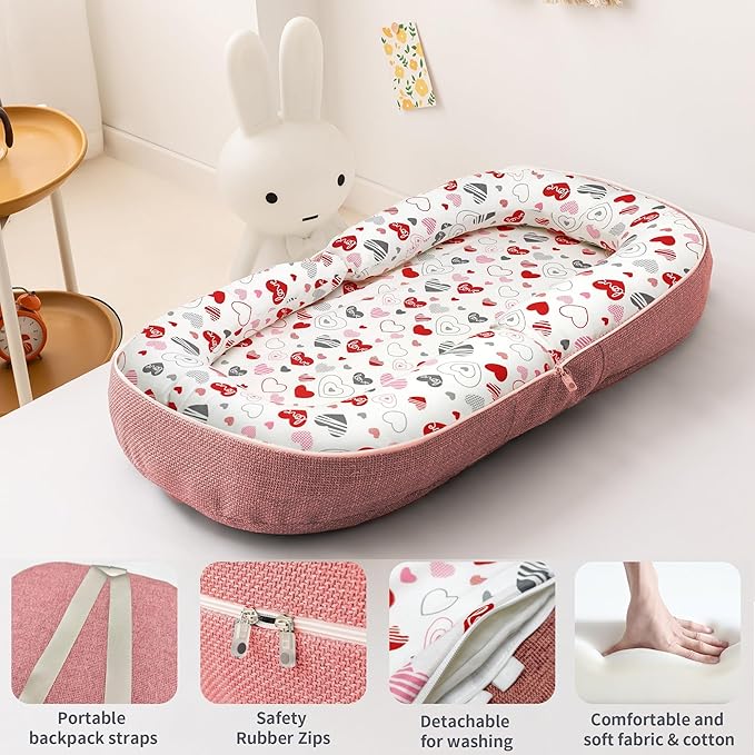 Baby Lounger, Foldable Infant Nest Pillow with Soft Memory Foam Mat, Cover with Adorable Pattern, Converts to Backpack for Easy Travel, 0-12 Months, Pink
