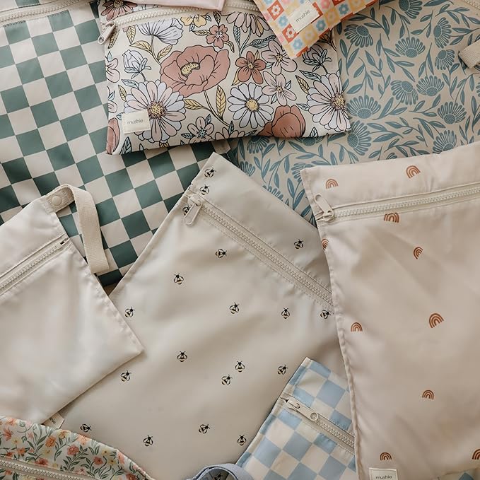 mushie Water Resistant Wet Bags | Large & Small Reusable Storage Bag for Baby Items and Travel | Zippered Pockets with Handle | Machine Washable, Set of 2 (Happy Flowers Check)